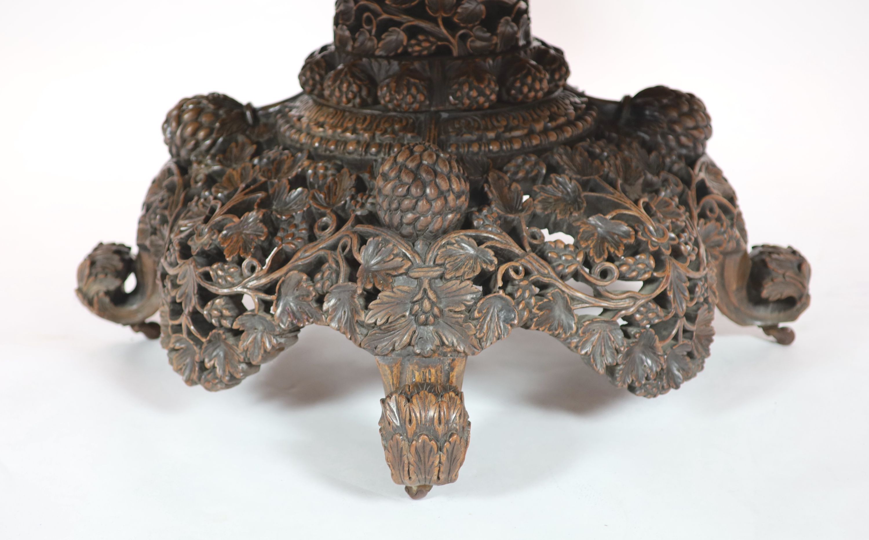 A 19th-century Ceylonese rosewood centre table, D 163cm. H 70cm.